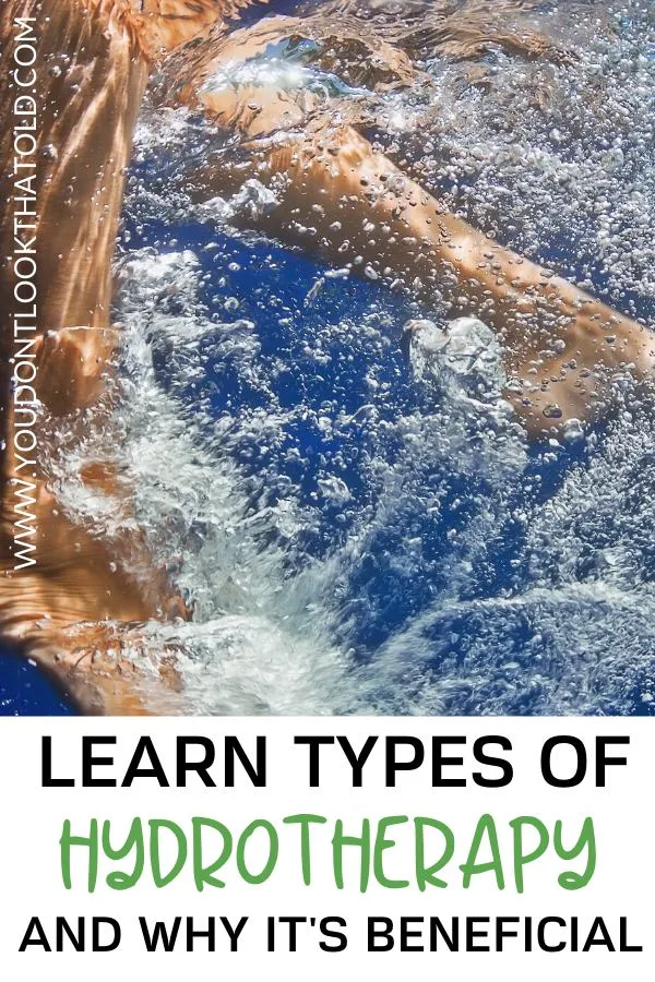 A woman's feet kicking in the water and making bubbles.